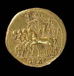 Aureus (reverse) of the deified Claudius (AD 41-AD 54) minted under Nero (AD 54-AD 68) depicting a chariot with four horses. Inscription: EX SC
